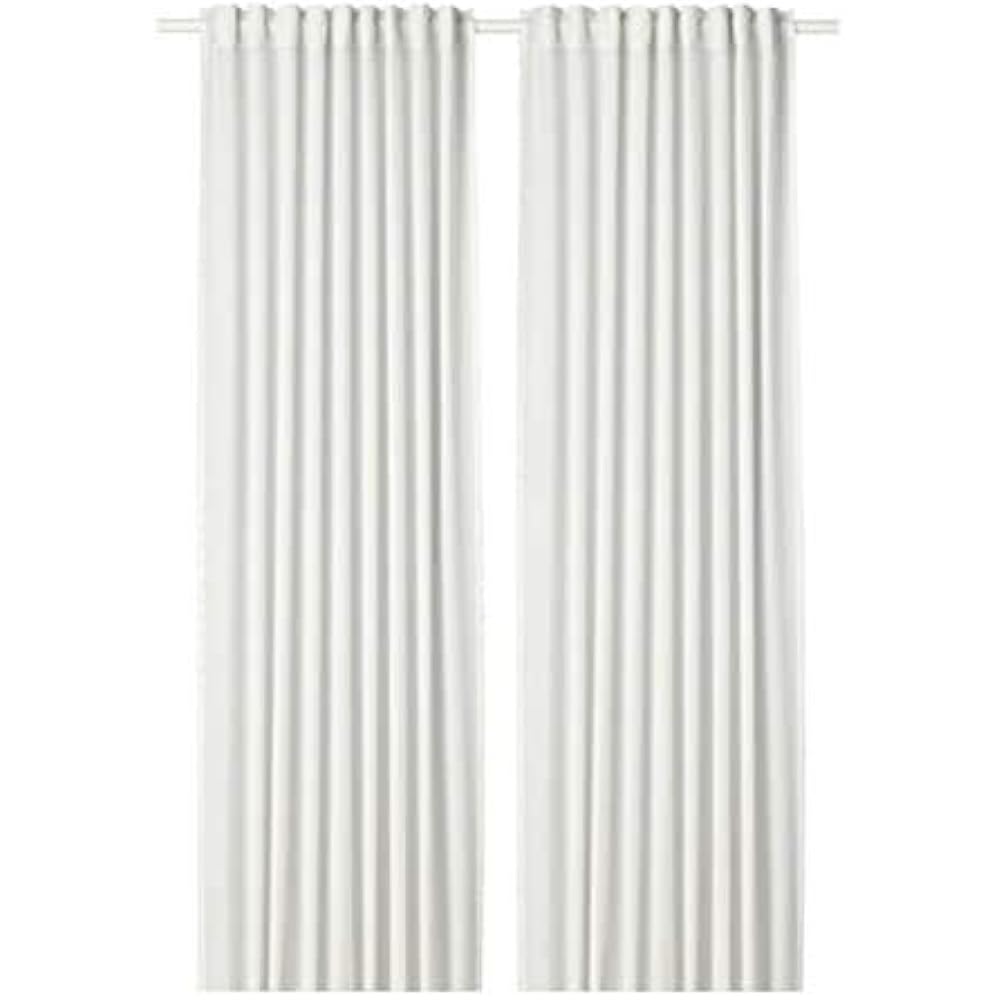 White semi-sheer 100% polyester curtains hanging on a rod close up texture